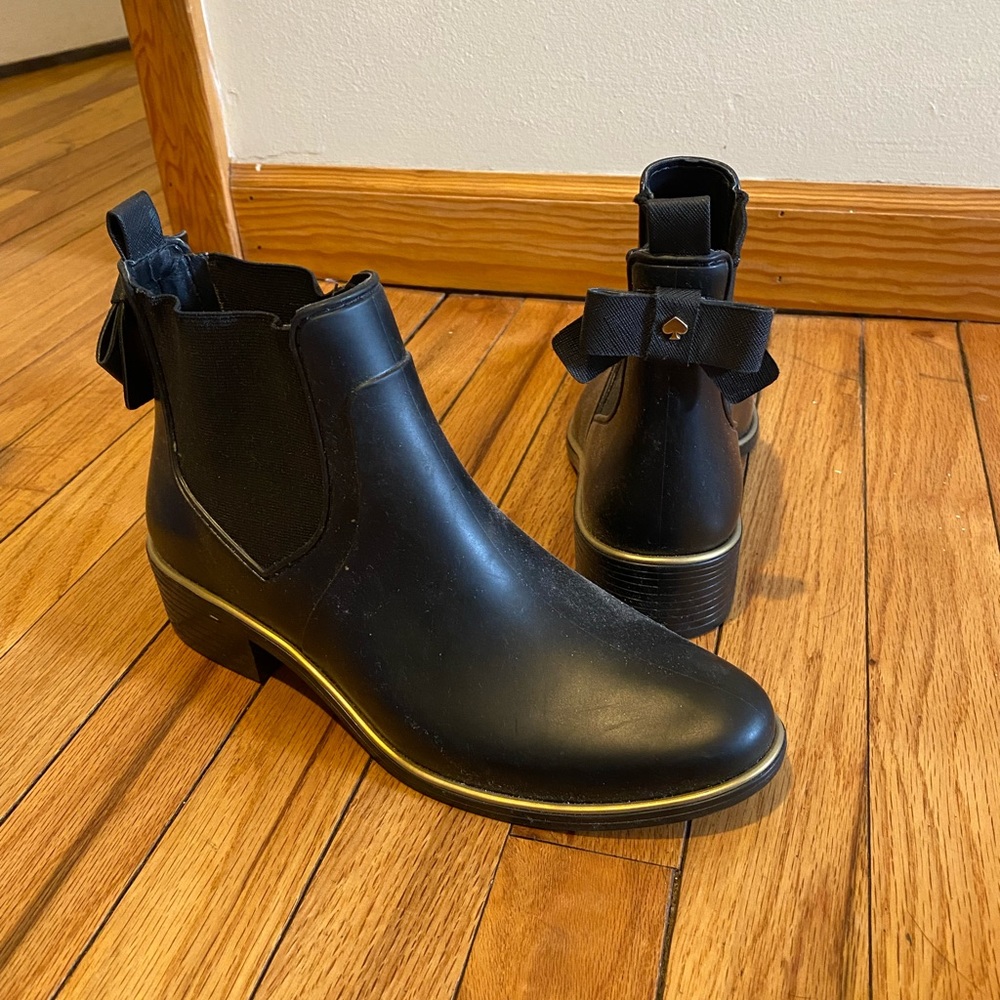 Never word black kate spade booties in the size 8